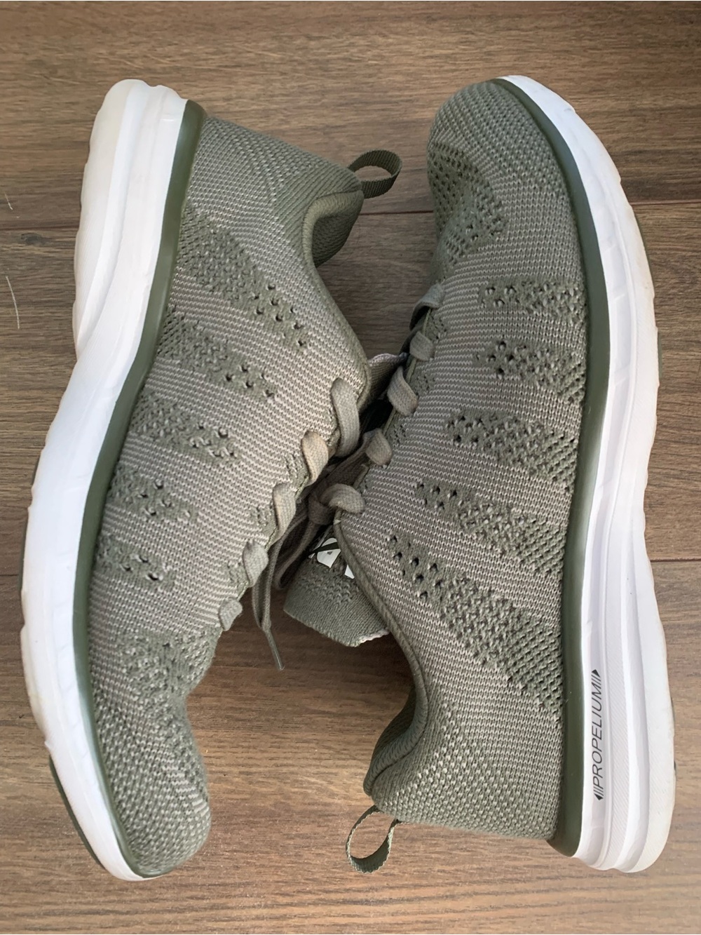 APL women’s Knit Trainer - Olive size 10
